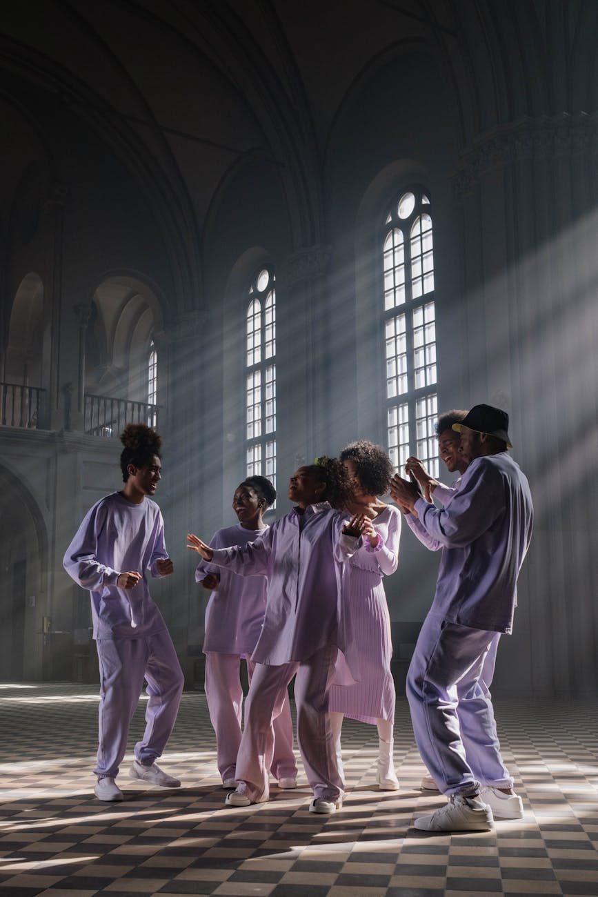 group of people in lilac uniform doing church service